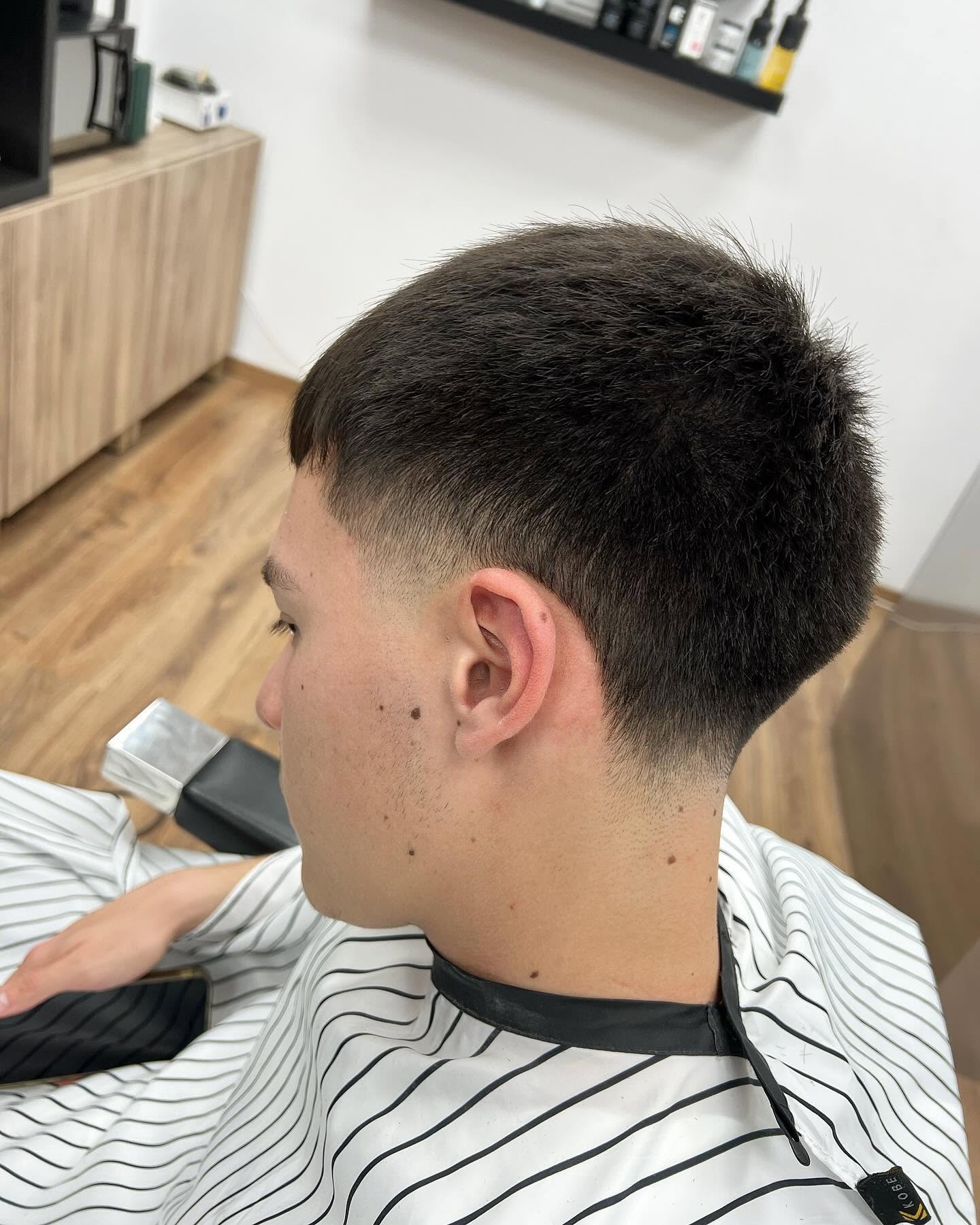 Textured crop and fade finished at Andys Barbershop